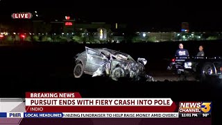Pursuit ends with rollover crash into pole
