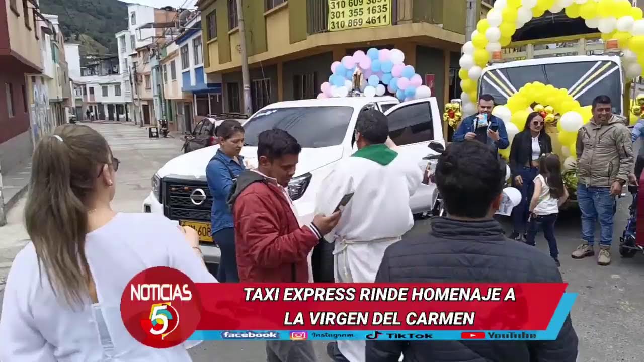 TAXI EXPRESS RINDE HOMENAJE A LA VIRGEN DEL CARMEN