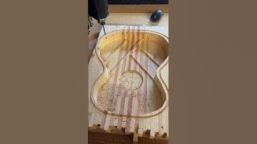 Parlor acoustic guitar made from salvaged pine from a pallet