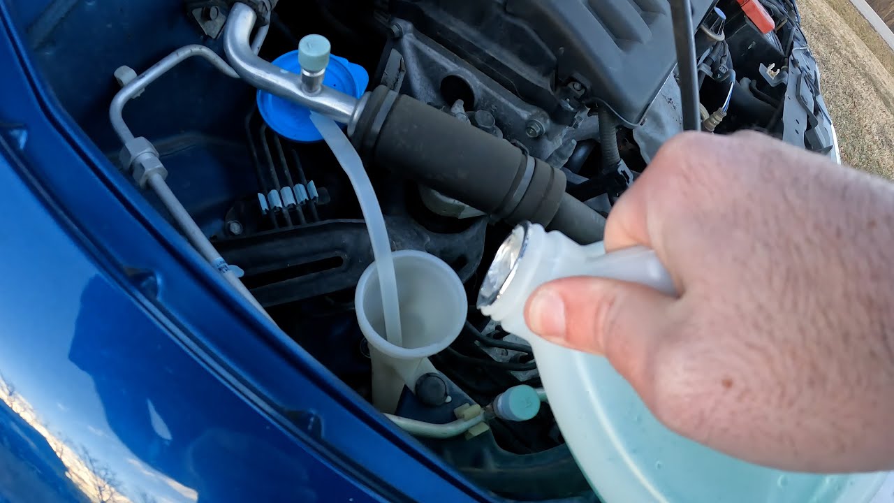 Annoyed by wiper fluid refill position? Get one of these at your local