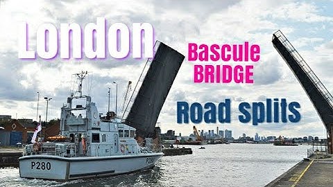 Walking London draw bridge that splits road into two , bascule  Bridge that opens and closes