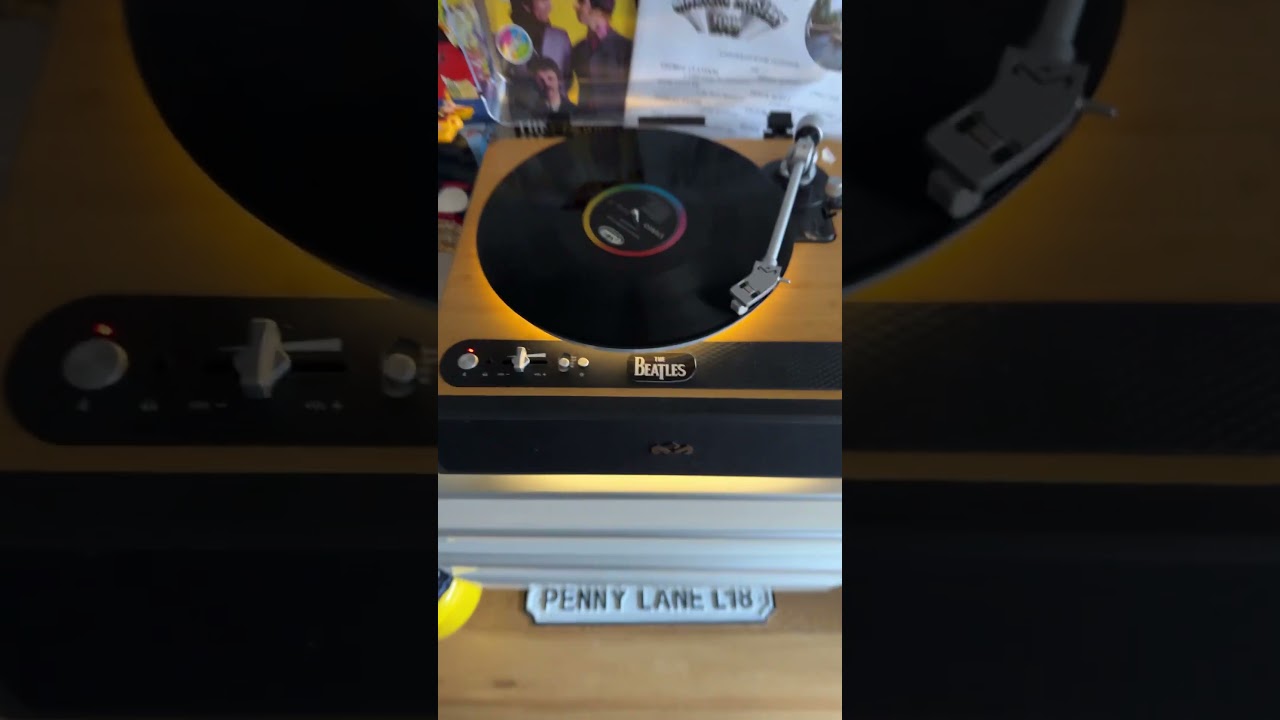 Hello goodbye by the Beatles on record player 