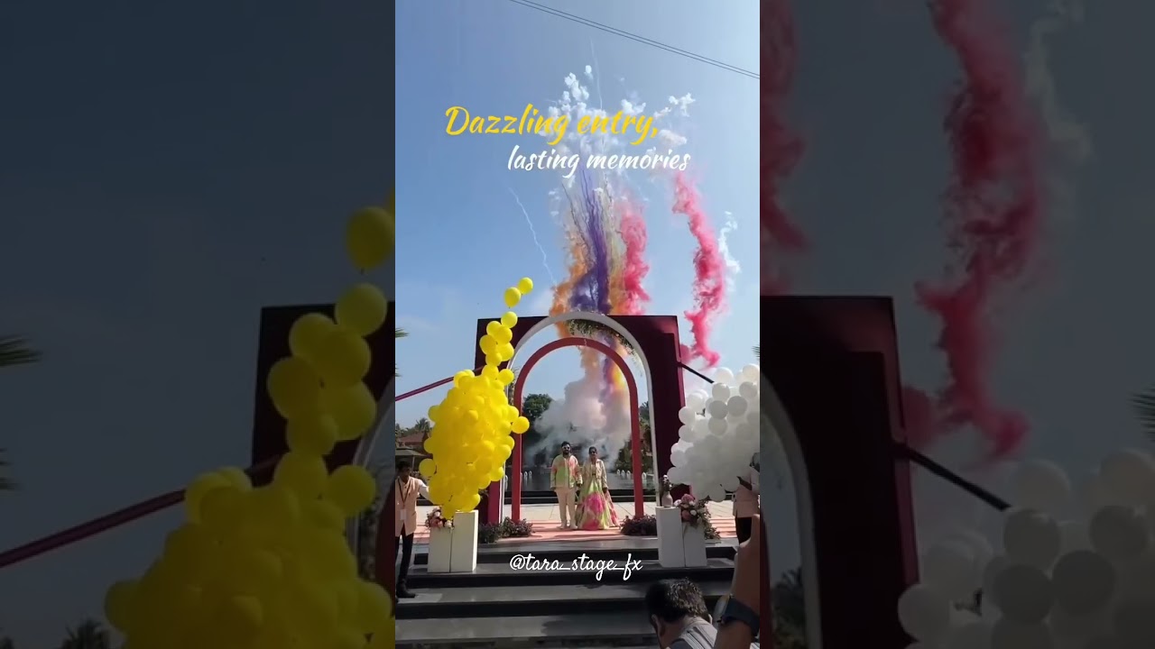 Dazzling couple Entry with balloons & color shot 
