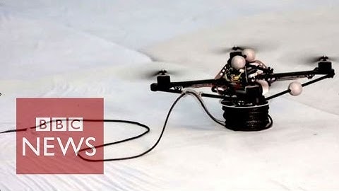 Drones build rope bridge that humans can cross - BBC News