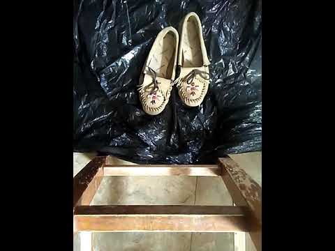 Moccasins crushing fruit
