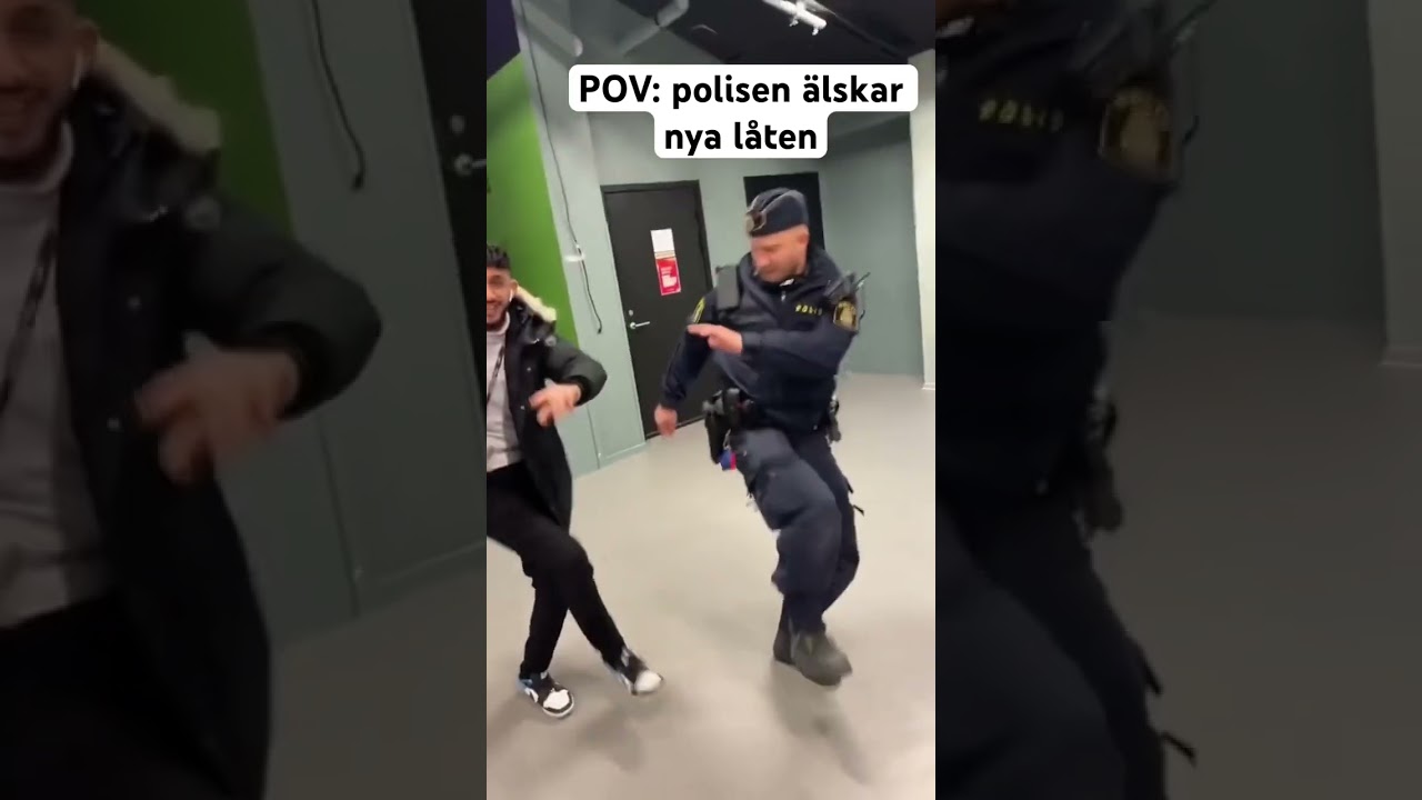 Polisen dansar till rap musik 
