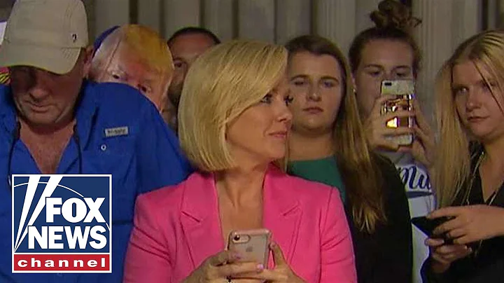 Protesters scream at Fox anchor
