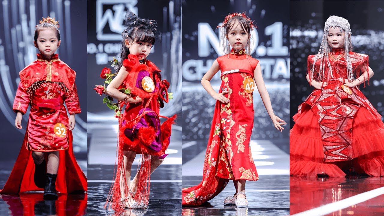 Very cute child walks fashion show wearing red themed clothes Fashion