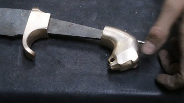 Forging a pattern welded Falcata machete , part 3, sculpting the pommel.