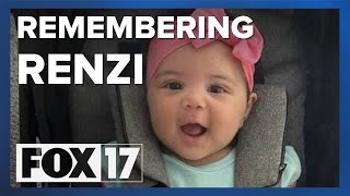 Family lights candles for Reed City baby allegedly beaten to death