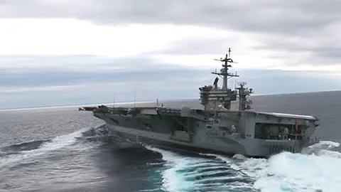 Watch a 100,000 ton US aircraft carrier make hairpin turns and do donuts at surprising speed