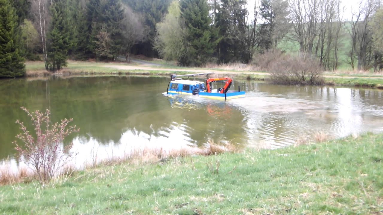 HELLGETH Hägglunds 2.7CDI with Palfinger crane swimming