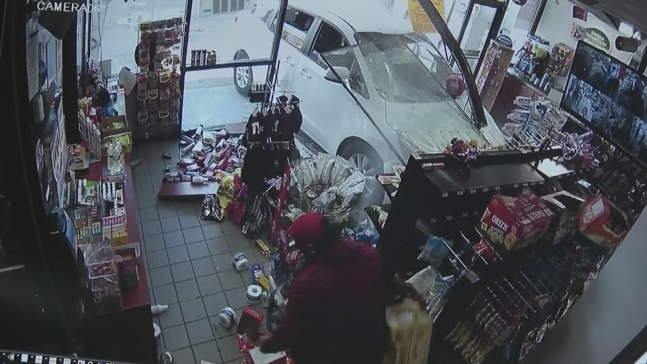 Terrifying moment car crashes through shop window YouTube