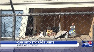 Car drives through fence, into Redmond storage units