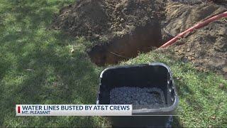 Water lines busted by AT&T crews