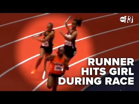 Runner caught on video hitting girl with a baton during race