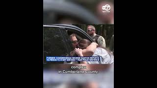 Disgraced former US Rep. George Santos embraces crying support on way to prison