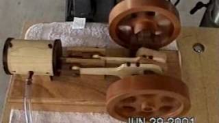 All wood model steam engine running 100% wooden "steam" engine built of walnut, maple, cherry and redheart woods. All parts are held together using friction fit #2