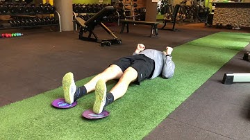 Hip Bridge to Eccentric Hamstring Curl with Sliders