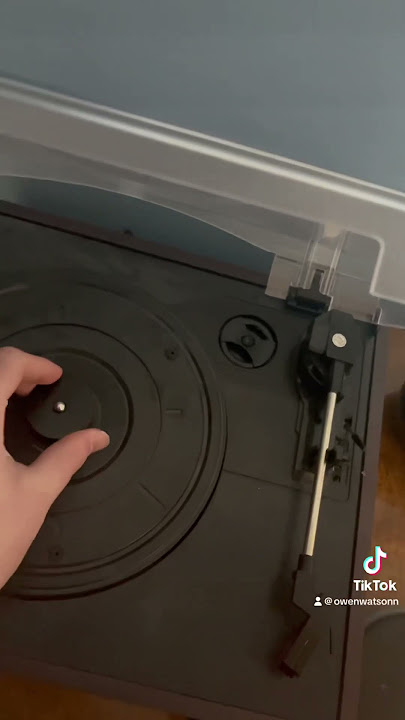 How to put a 45 rpm single adapter into your record player.