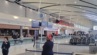 Navigating Between Concourses at the Detroit Metro Airport, including the Concourse A Tram