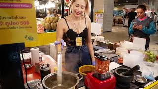 Amazing Women Cooking Thai Salad and Seafood at Street Food Festival Lady in Bangkok