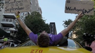 Hundreds of cyclists stage a 'die in' protest in NYC for safer streets