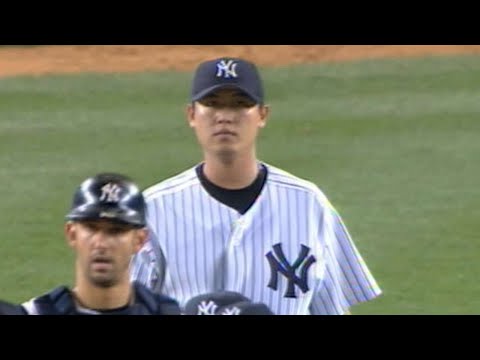 L-R) Former baseball pitcher Chien-Ming Wang, Sons J.J. Wang and