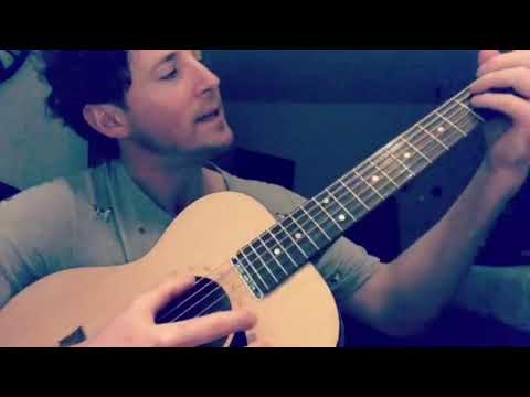 Emma and Lachy playing Guitar