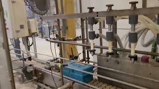 110 - 9-head enclosed pressure filler - Auction Sale ending August 10th - Laval, Quebec www.C3.com
