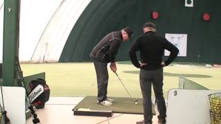 Hands close to the body on downswing