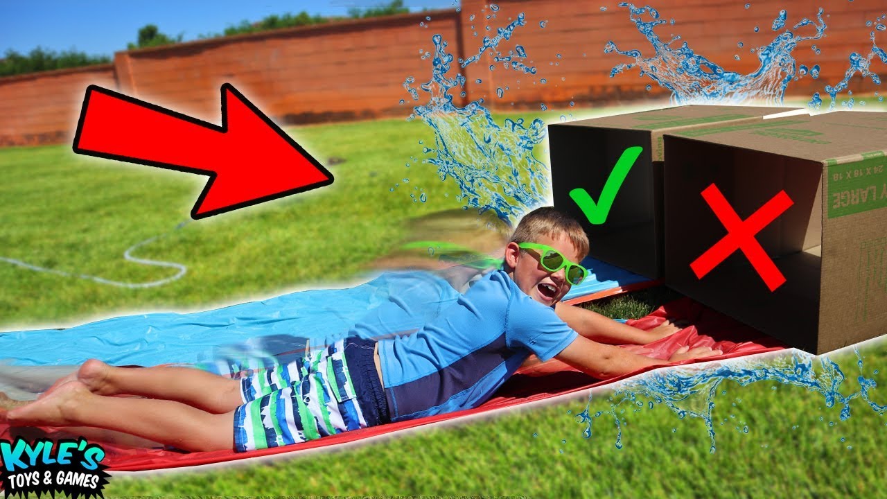 TRY NOT TO Slip 'N Slide Through the Wrong MYSTERY BOX!! HILARIOUS