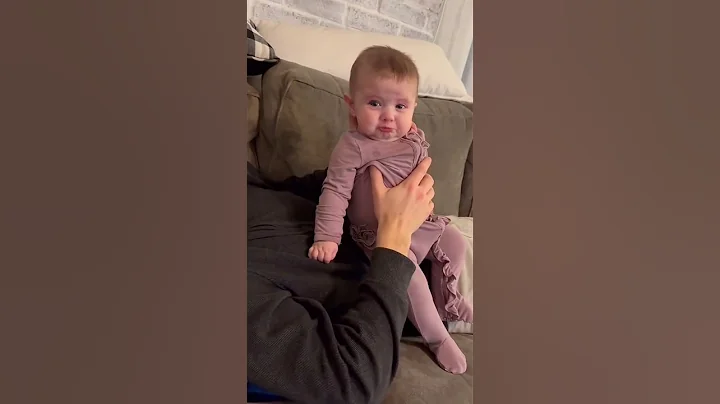 Babies reaction to dad’s kisses
