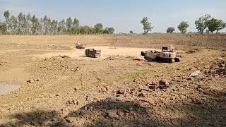 Excavator Cat Loading Dump Trucks 