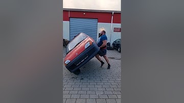 destroy a car in strongman style. #destroy #car #strongman #style