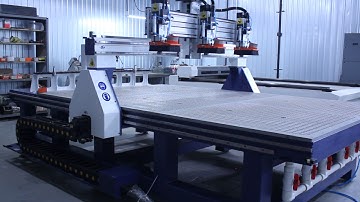 ATS-3020(Custom) with 3 synchronously working electrospindles and automatic tool change.