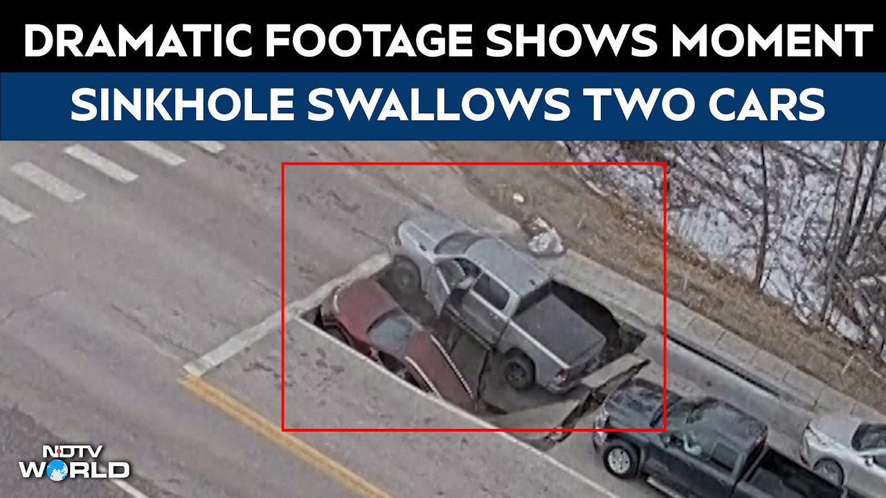 Dramatic Footage Shows Moment Sinkhole Swallows 2 Cars At Traffic Signal In US