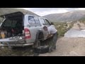 Fixing a broken leaf spring on an Altai mountain pass