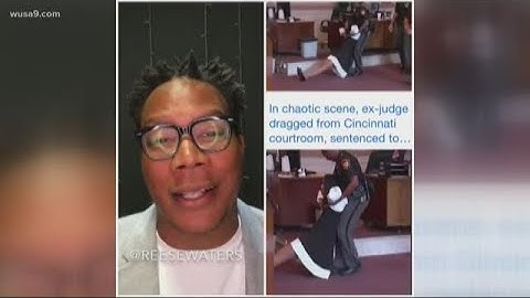 Watch this ex-judge getting dragged out of a courtroom