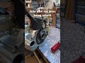 A Stihl 044 red lever being rebuilt.