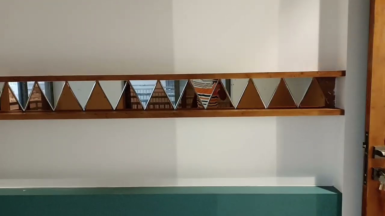 kitchen profile shutter with gray back painted glass and walldrop shutter work completed 