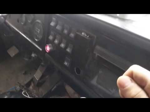 Installing a windshield wiper relay in a standard KAMAZ truck.