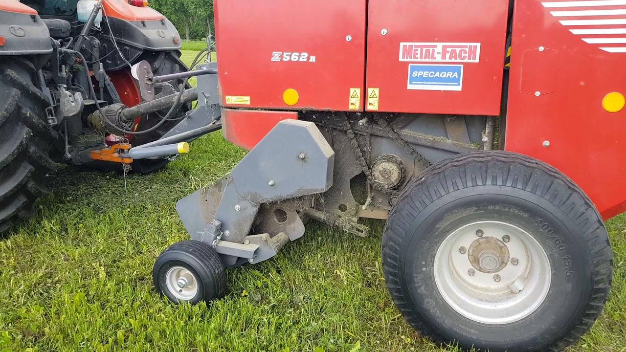 Metal-Fach Z562R baler and Kubota M5111