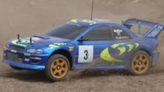 Cheapish Hpi 1/10  Subaru Impreza body with Aliexpress chassis. Hobbywing esc/motor Colin McRae's 
