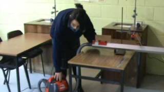 Verifying the principle of conservation of momentum with an air track