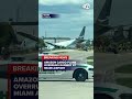 Amazon cargo plane sends up billowing cloud of smoke after overrunning runway at Miami airport