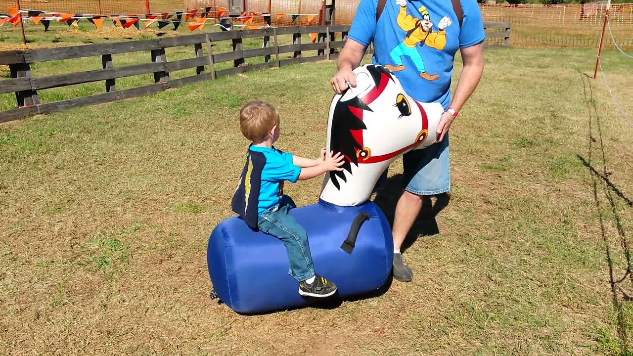 Riding inflatable horse YouTube