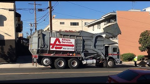 Athens Services- Peterbilt 320 Amrep Octagonal Front Loader