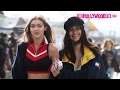 Gigi & Bella Hadid Arrive To Tommy Hilfiger's "Tommyland" Theme Park In Venice Beach 2.8.17