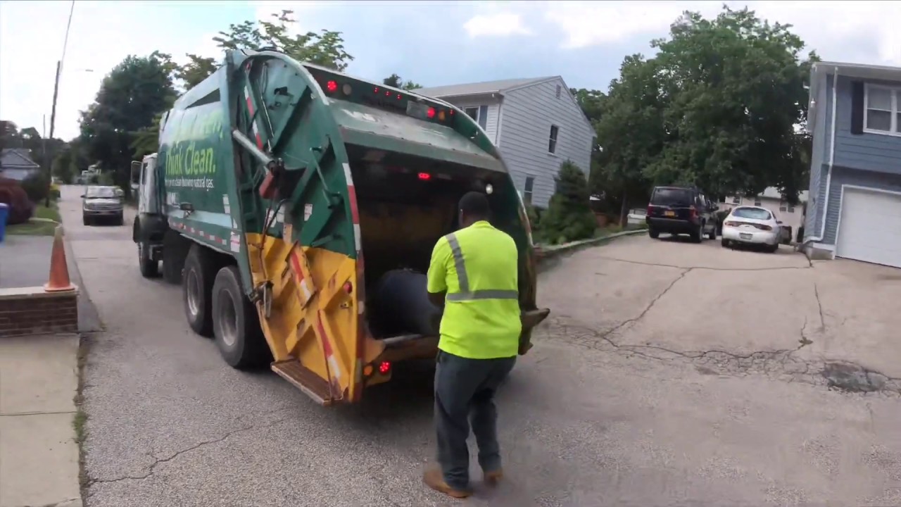 WM Rear loader 311683 packing yard waste late in the day - YouTube